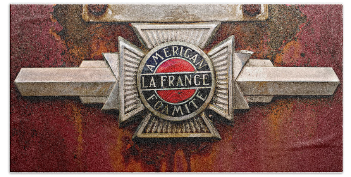 Fire Truck Hand Towel featuring the photograph American LaFrance Foamite Badge by Mary Jo Allen