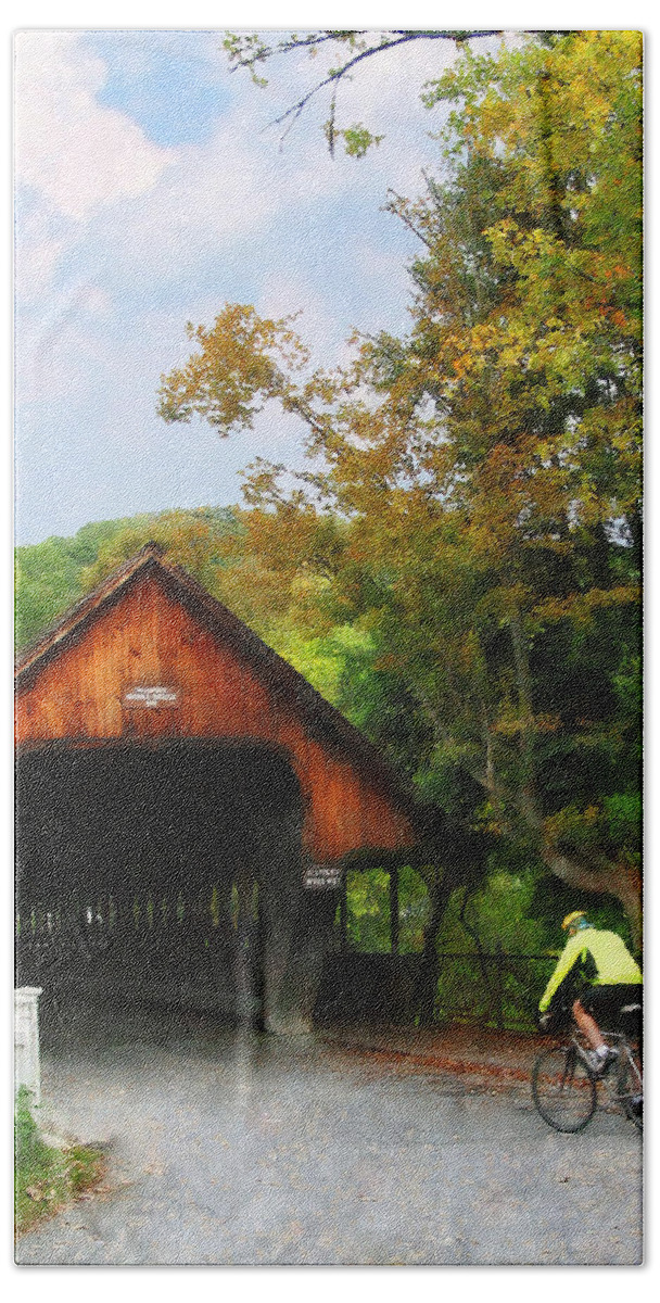 Bicycle Bath Sheet featuring the photograph Bicyclist at Middle Bridge Woodstock VT by Susan Savad