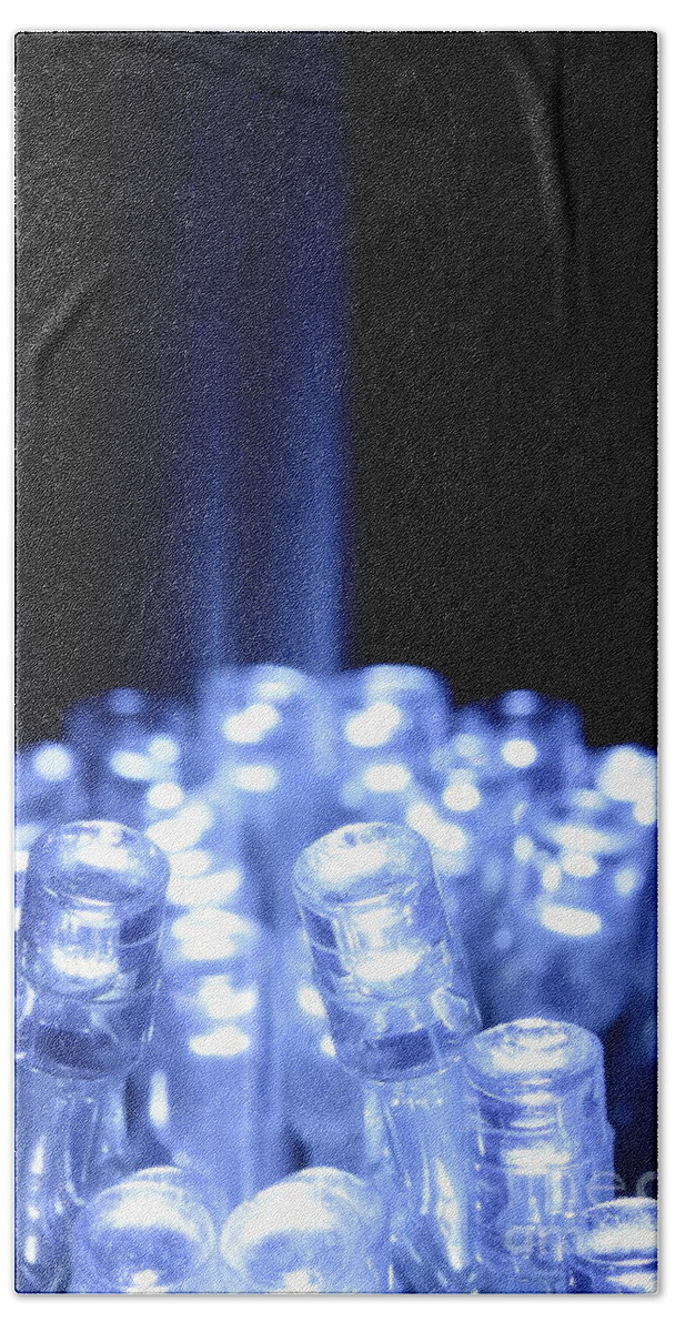 Abstract Bath Towel featuring the photograph Blue LED lights with light beam by Simon Bratt
