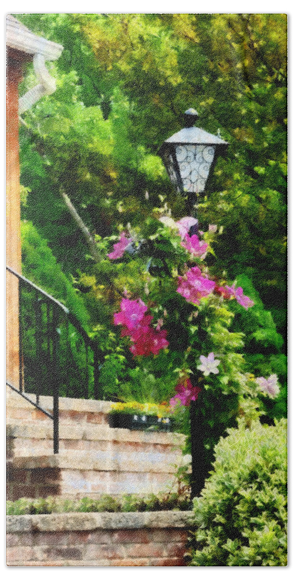 Lamp Post Bath Towel featuring the photograph Clematis on a Lamp Post by Susan Savad
