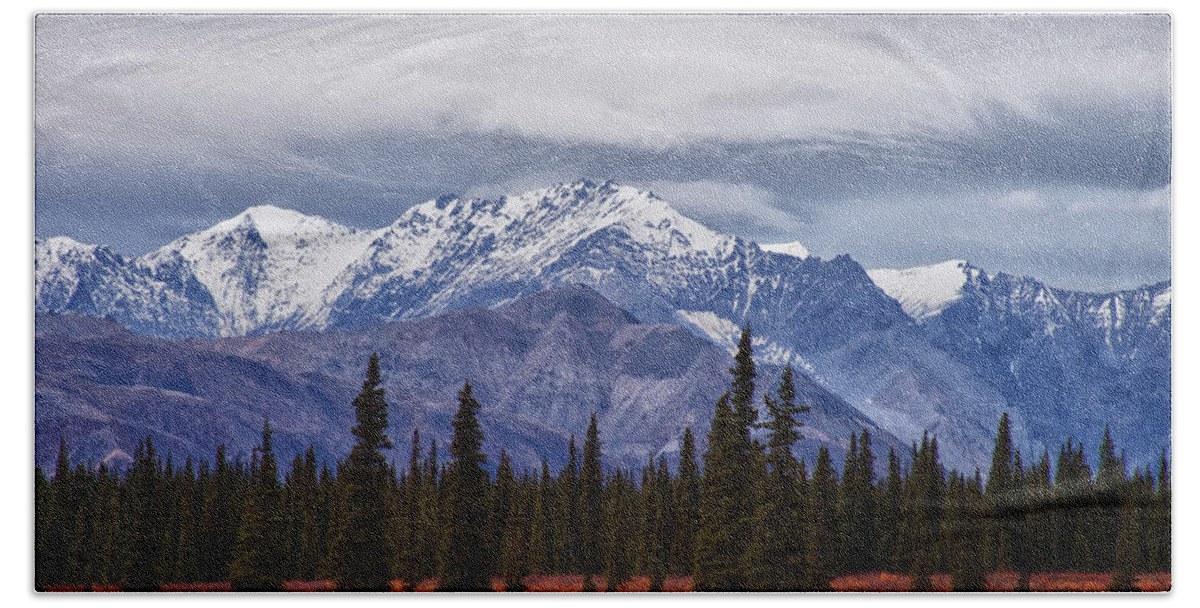 Alaskan Mountains Hand Towel featuring the photograph Clouds over mountains by Jeff Folger