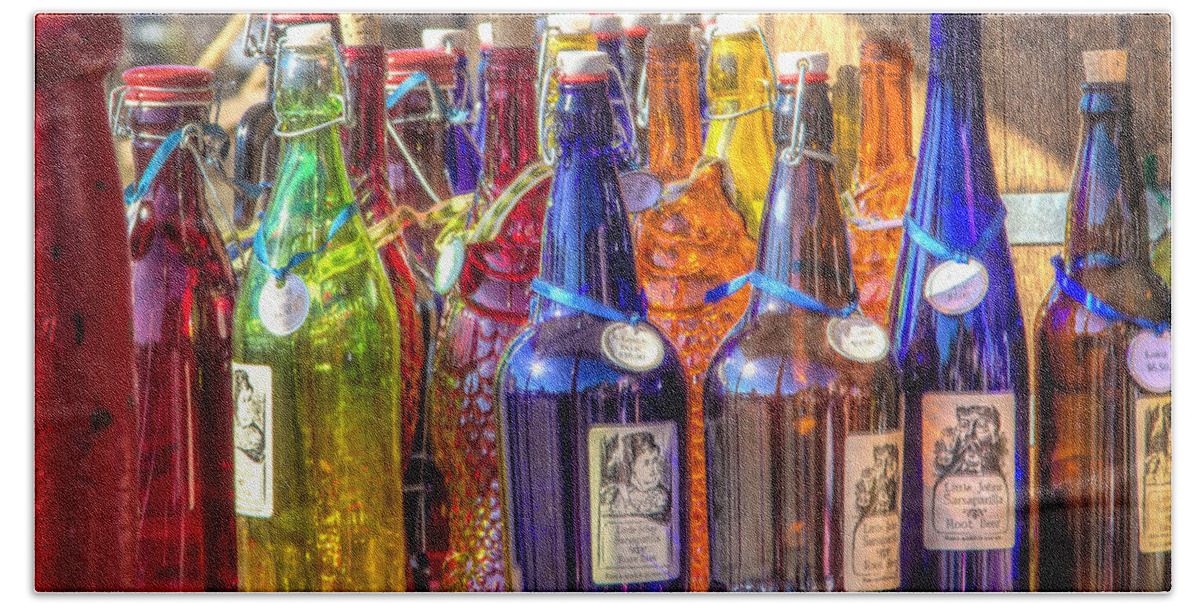 Brooksville Bath Towel featuring the photograph Colorful bottles by Jane Luxton