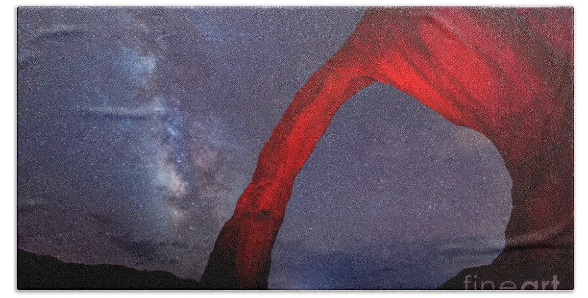 Sunset Bath Towel featuring the photograph Corona Arch Milk Way red light by Michael Ver Sprill