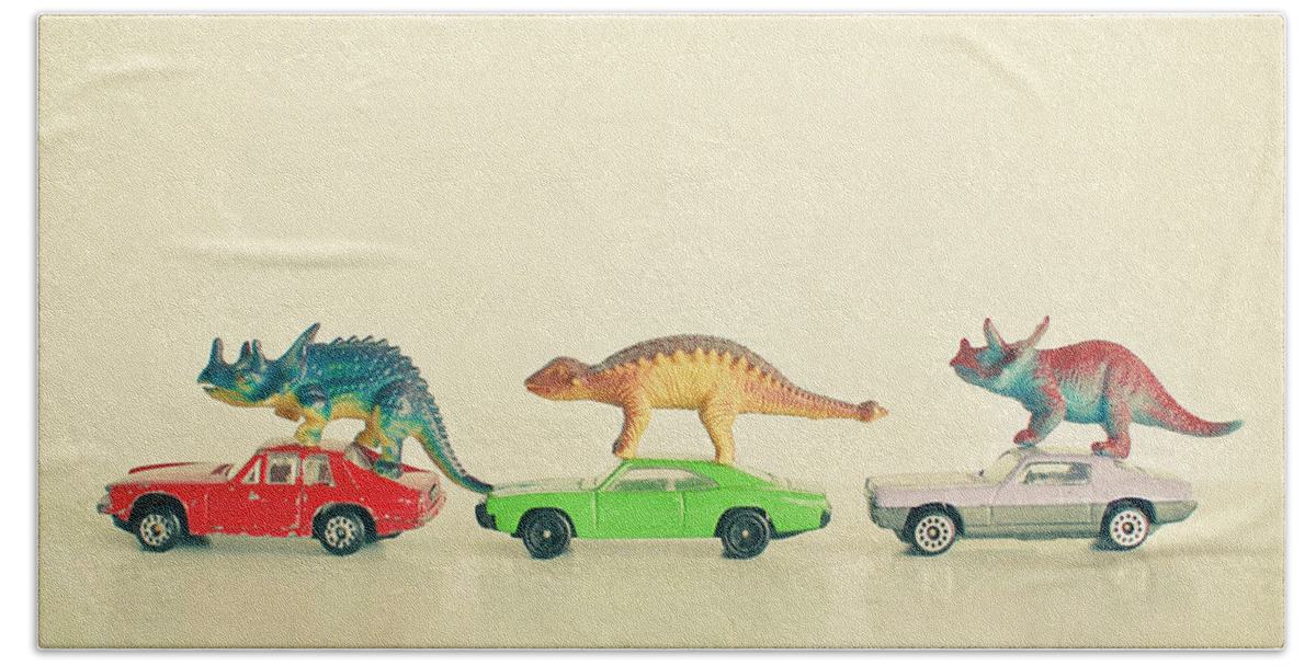 Dinosaur Photograph Hand Towel featuring the photograph Dinosaurs Ride Cars by Cassia Beck