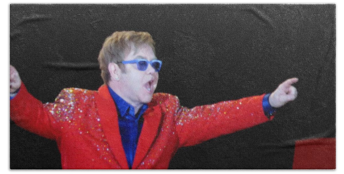 Elton Hand Towel featuring the photograph EJ plays soldout concert by Aaron Martens