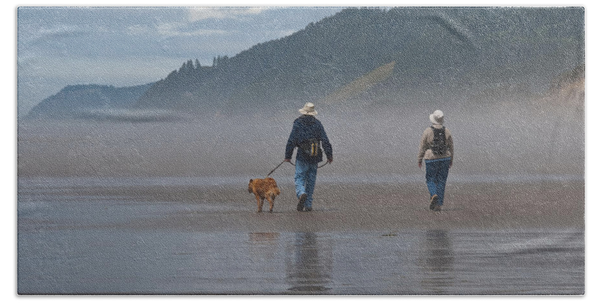 Active Seniors Bath Towel featuring the photograph Elderly Couple Walking a Dog by Jeff Goulden
