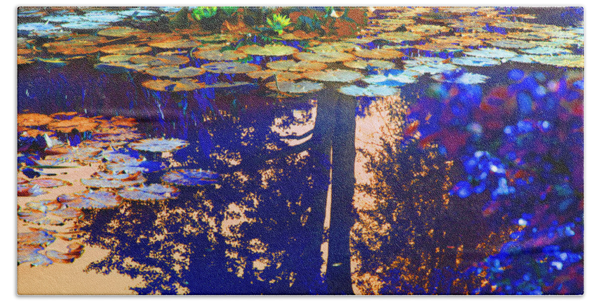 Garden Pond Bath Towel featuring the photograph Evening Glow on the Lily Pond by John Lautermilch