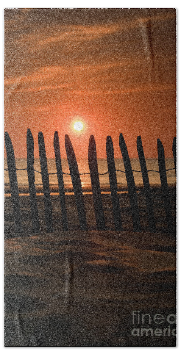 Beach Hand Towel featuring the photograph Fence at Sunset by David Lichtneker