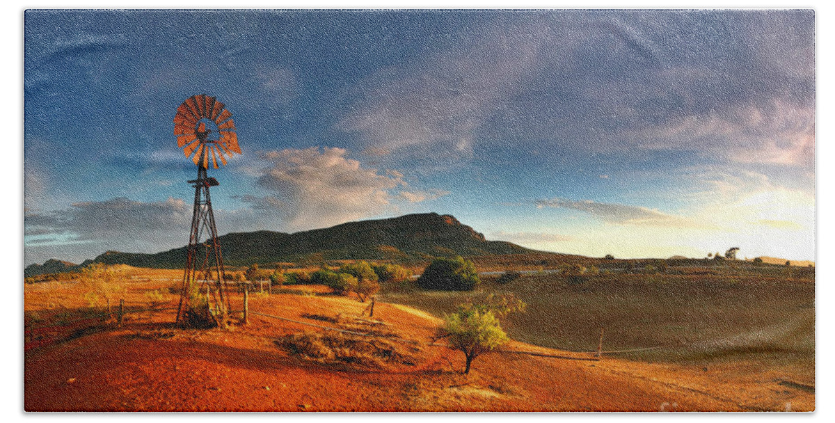 First Light Early Morning Windmill Dam Rawnsley Bluff Wilpena Pound Flinders Ranges South Australia Australian Landscape Landscapes Outback Red Earth Blue Sky Dry Arid Harsh Hand Towel featuring the photograph First Light on Wilpena Pound by Bill Robinson