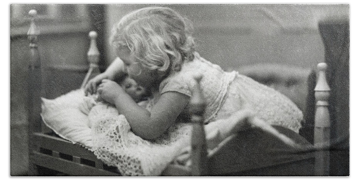 1 Person Bath Towel featuring the photograph Girl Puts Doll To Bed by Underwood Archives
