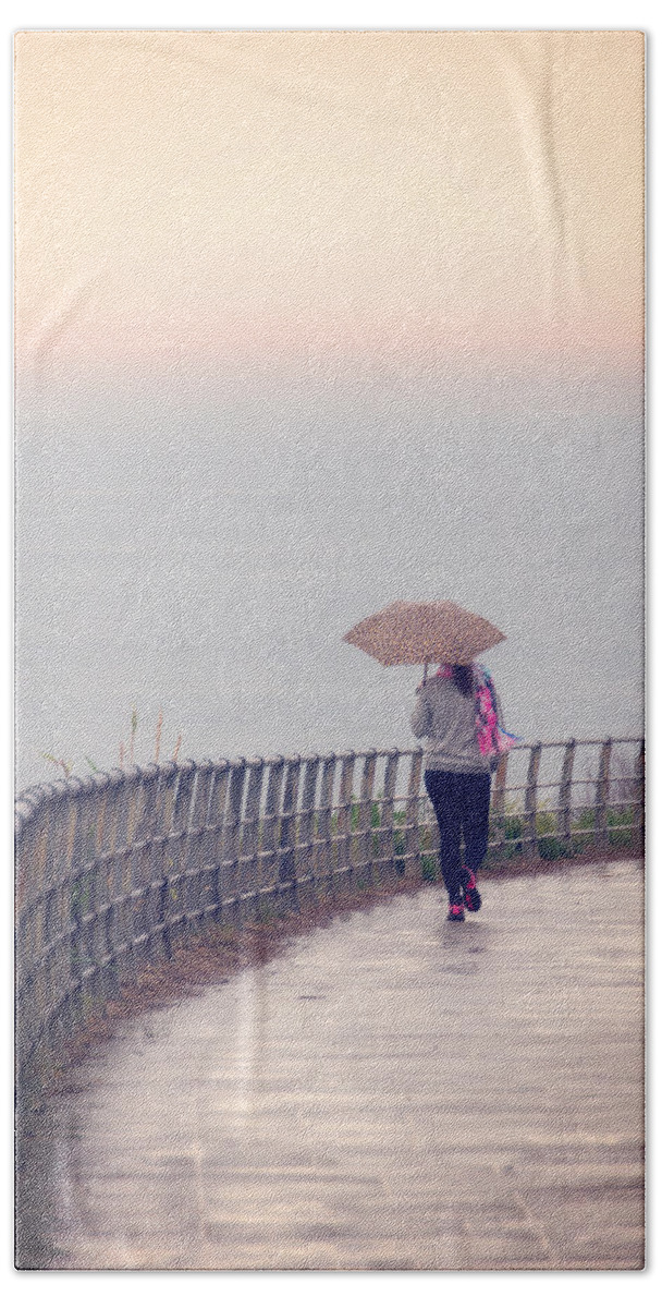 Umbrella Bath Towel featuring the photograph Girl Walking With Umbrella by Mikel Martinez de Osaba