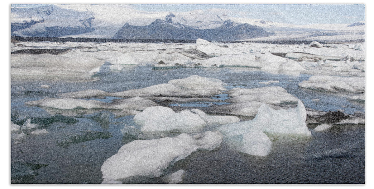 Flpa Bath Towel featuring the photograph Glacial Icebergs In Jokulsarlon Lagoon by Bill Coster