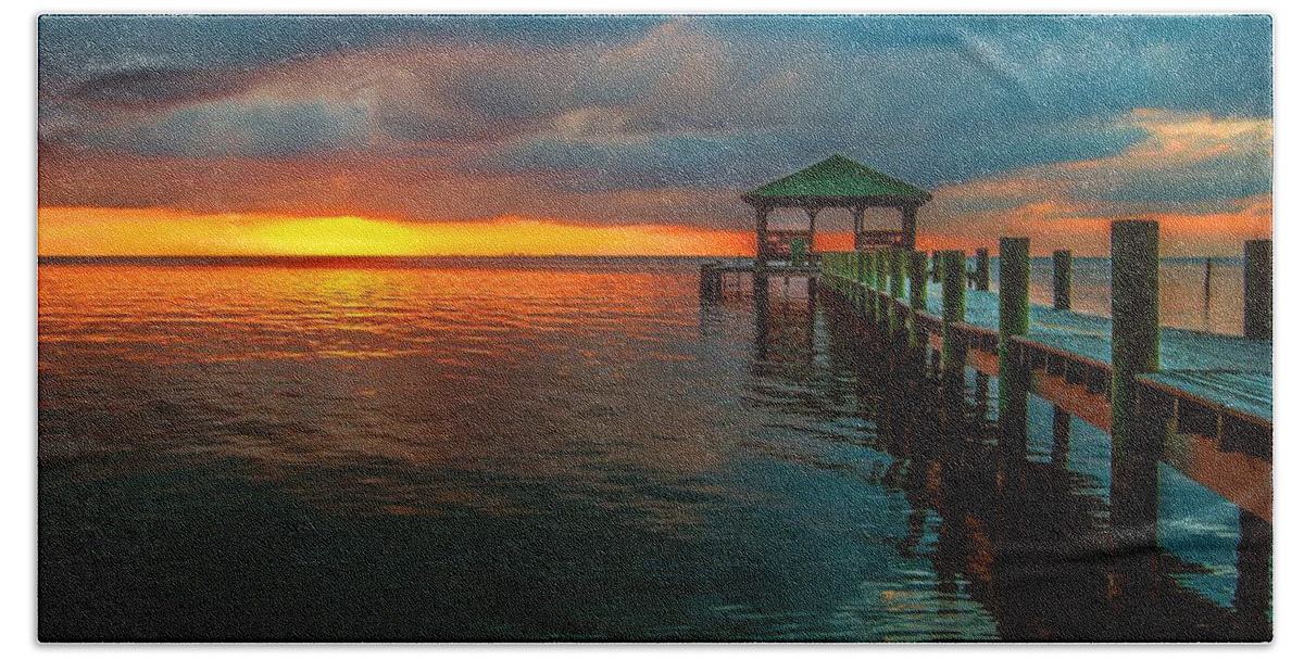 Palm Hand Towel featuring the digital art Green Dock and Golden Sky by Michael Thomas