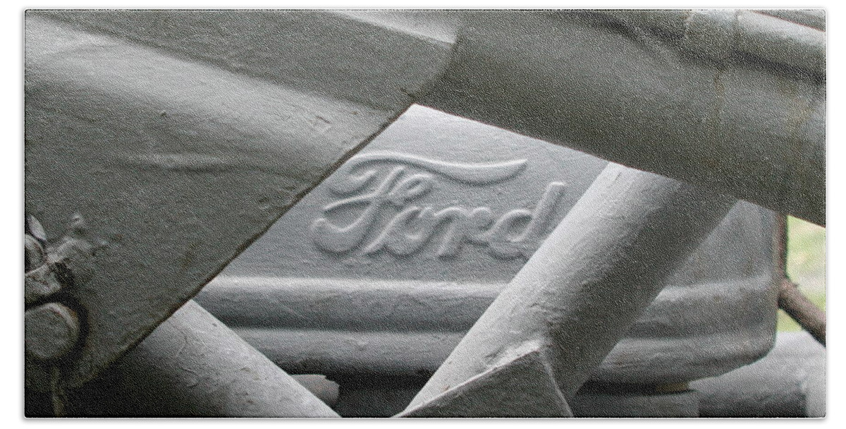 Ford Bath Towel featuring the photograph Grey Ford Tractor Logo by Anna Ruzsan