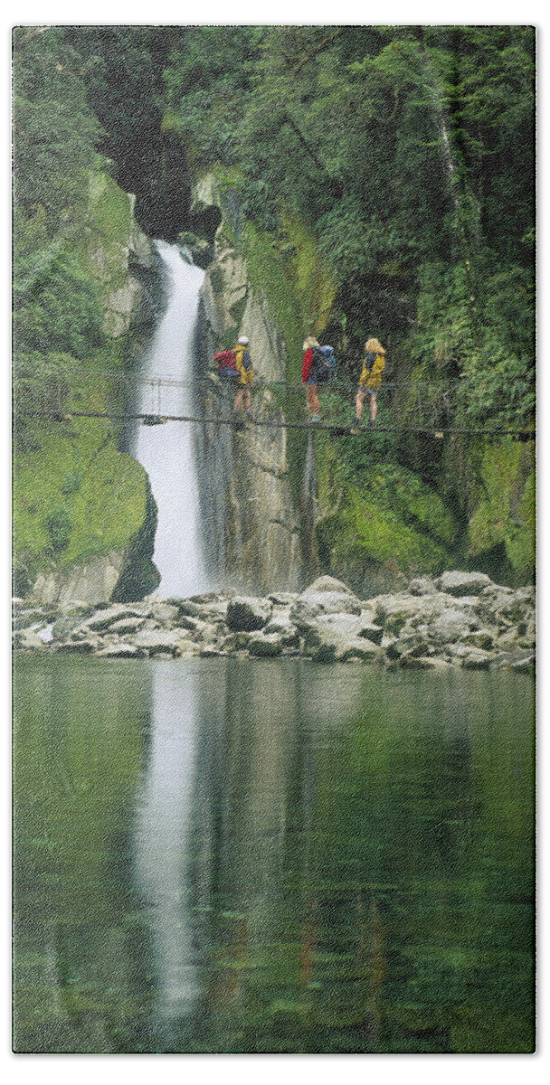 Feb0514 Hand Towel featuring the photograph Hikers On Bridge Giants Gates Falls by Colin Monteath