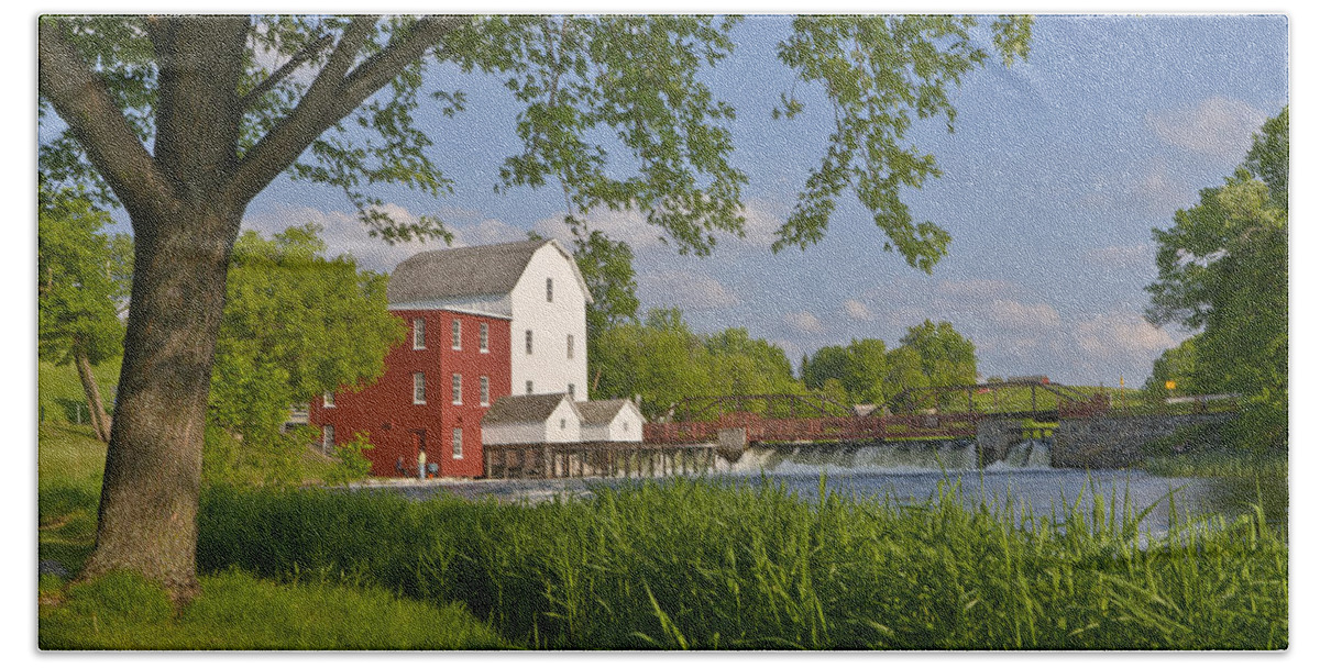 Building Bath Towel featuring the photograph Historic Flour Mill By a River by Lynn Hansen