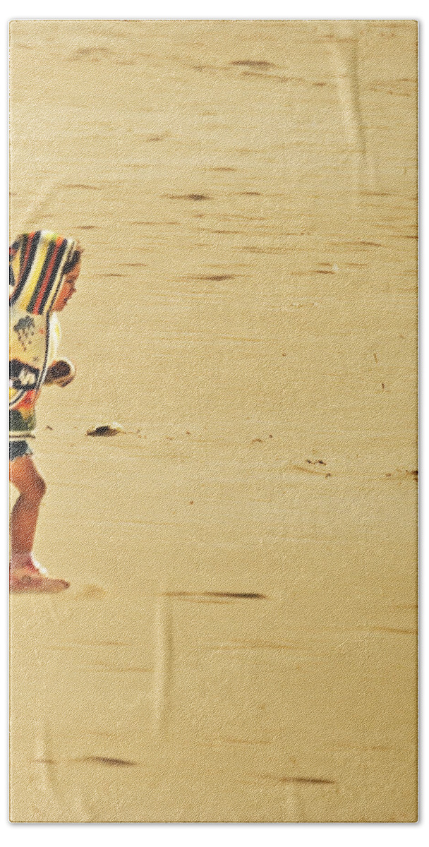 Girl In A Hoody Photographs Bath Towel featuring the photograph In Giant Footsteps by David Davies