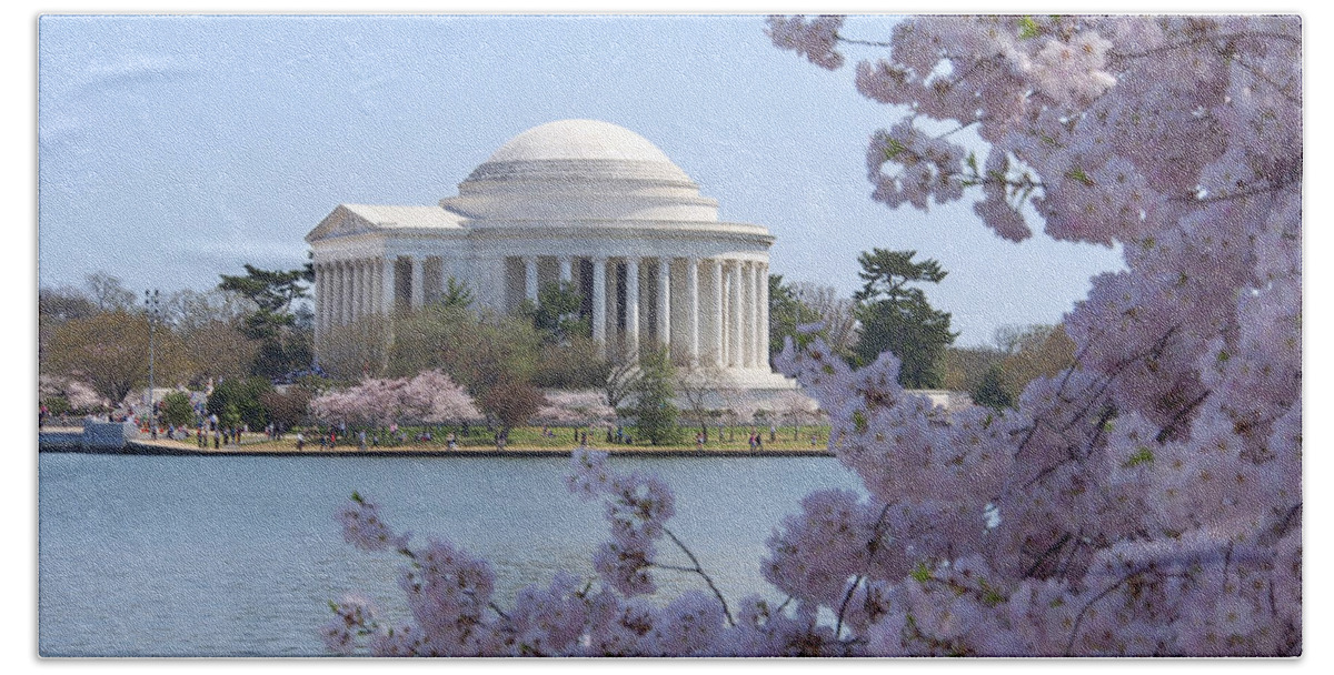 Landmarks Bath Towel featuring the photograph Jefferson Memorial - Cherry Blossoms by Mike McGlothlen