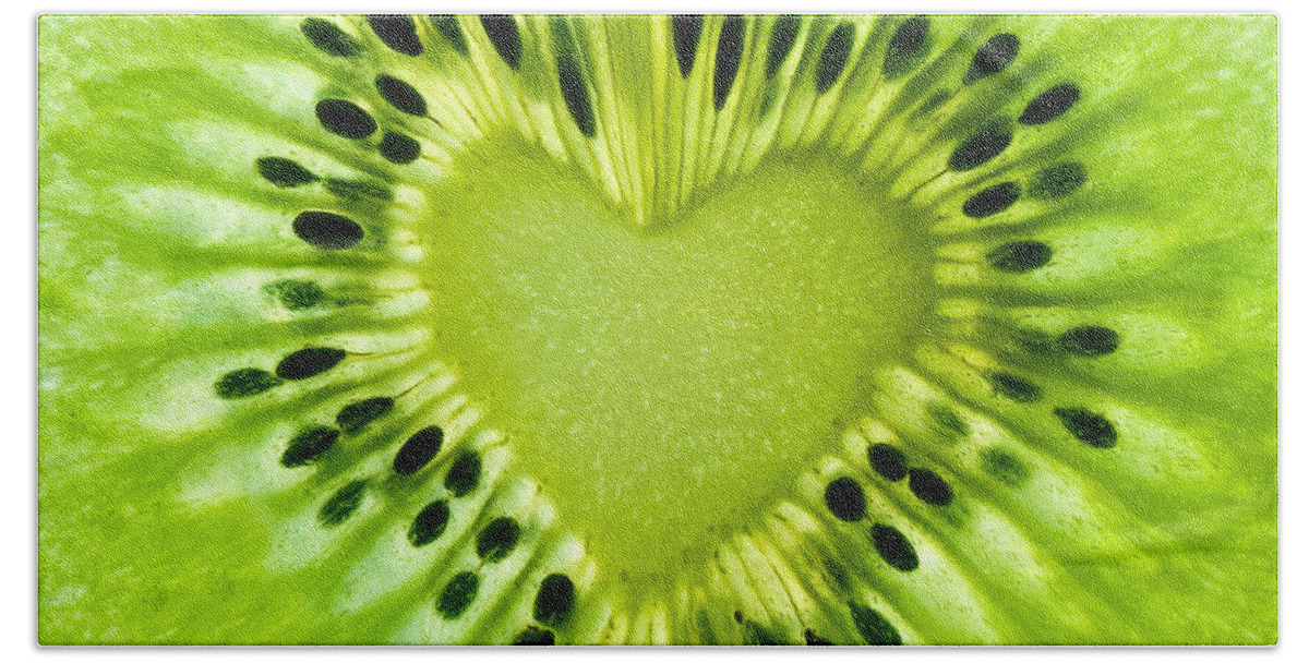 Kiwi Bath Towel featuring the photograph Kiwi heart by Delphimages Photo Creations