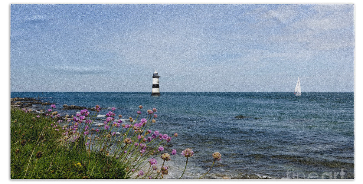 Lighthouse Bath Towel featuring the photograph Lighthouse at Penmon by Steev Stamford
