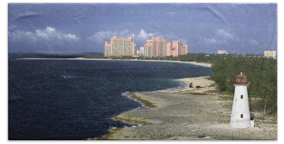 Atlantis Hand Towel featuring the photograph Lighthouse on Colonial Beach with Atlantis Paradise Resort Bahamas by Jatin Thakkar