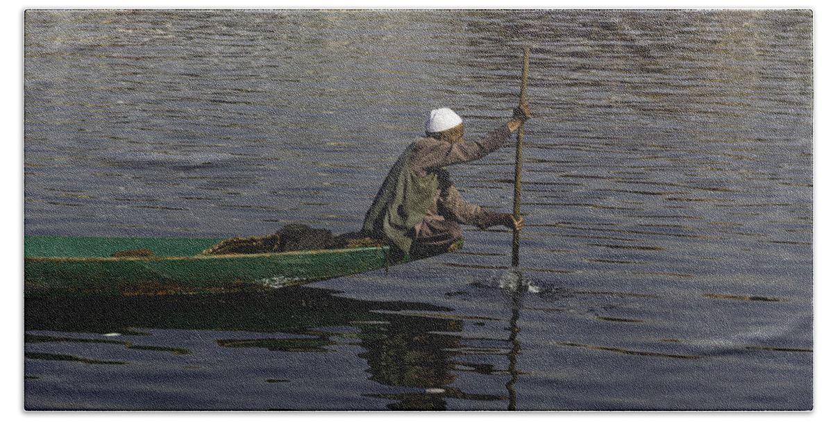 Beautiful Scene Bath Towel featuring the photograph Man plying a wooden boat on the Dal Lake by Ashish Agarwal