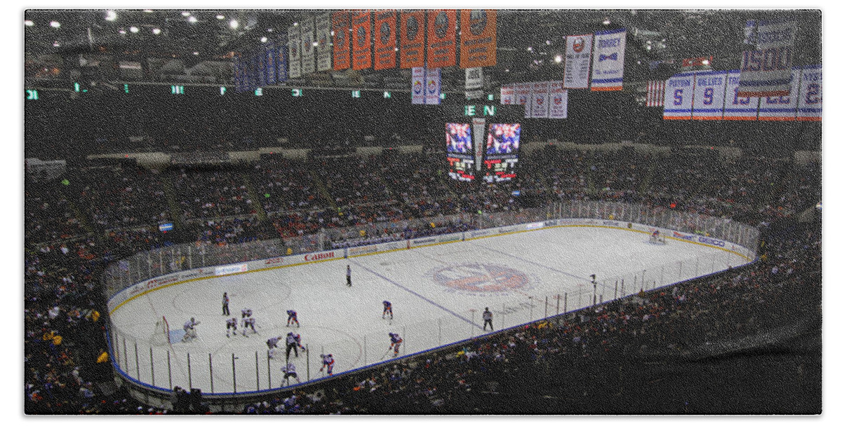 New York Islanders Hand Towel featuring the photograph New York Islanders by Juergen Roth