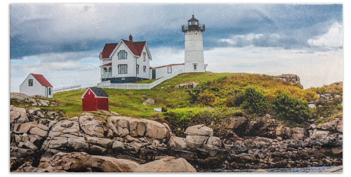 Fred Larson Hand Towel featuring the photograph Nubble Lighthouse by Fred Larson