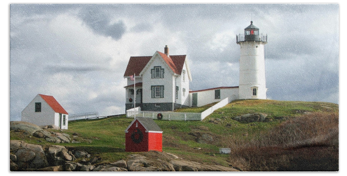 Lighthouse Hand Towel featuring the photograph Nubble Lighthouse by Nancy Landry