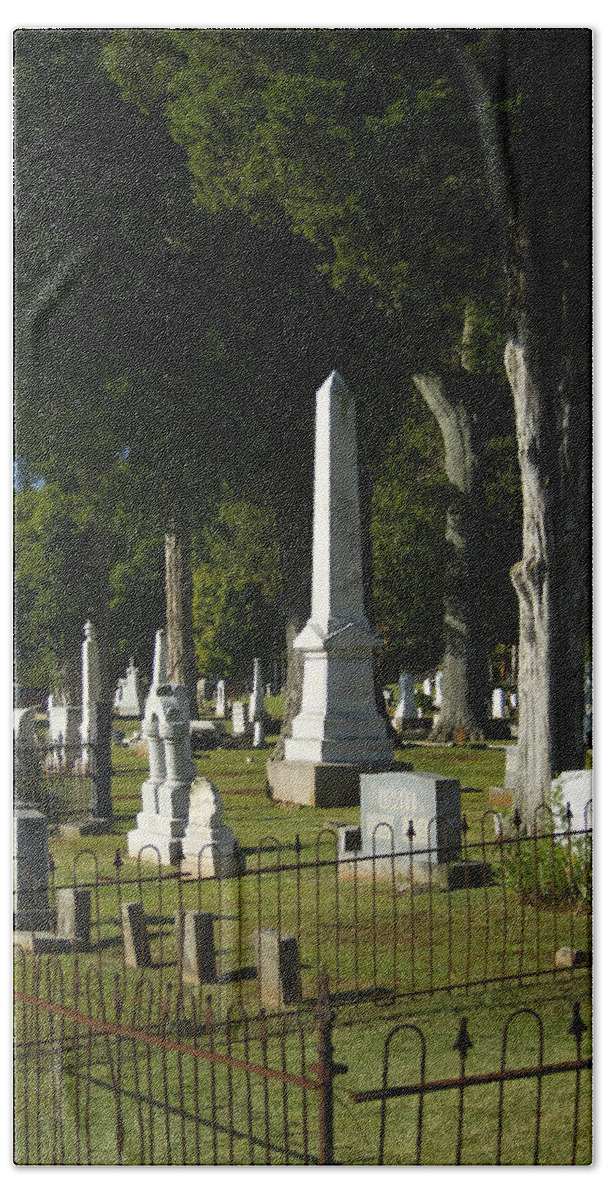 Graveyard Bath Towel featuring the photograph Obelisk and Headstones by Kathy Clark
