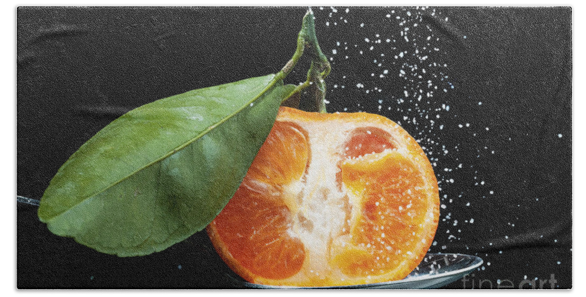 Orange Bath Towel featuring the photograph Orange half on spoon by Simon Bratt