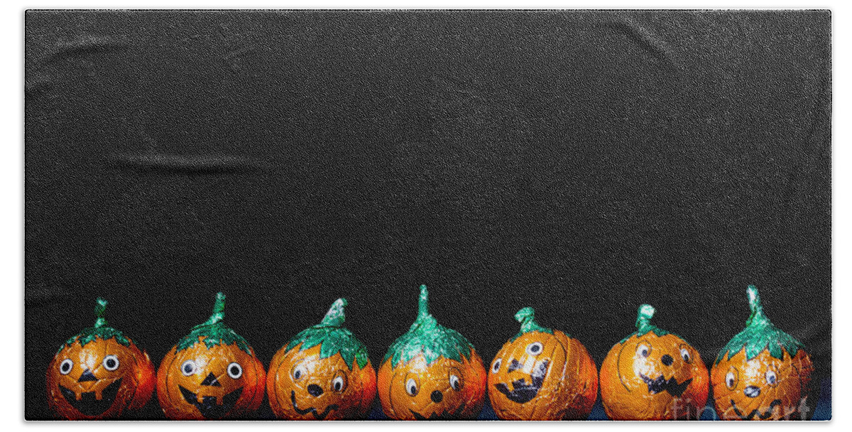 Orange Bath Towel featuring the photograph Orange pumpkin chocolates by Simon Bratt