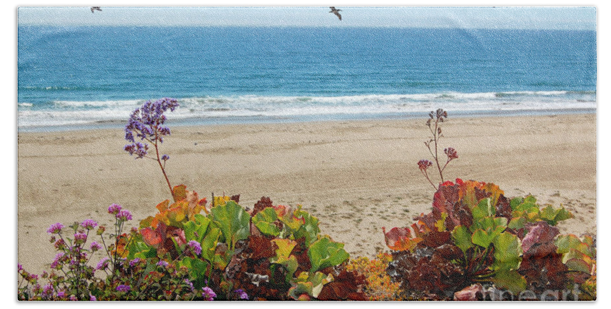 Pismo Beach Bath Towel featuring the photograph Pelicans And Flowers on Pismo Beach by Debra Thompson