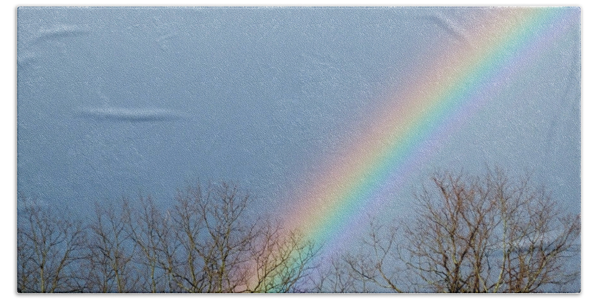 Artoffoxvox Bath Towel featuring the photograph Rainbow through the Tree Tops by Kristen Fox