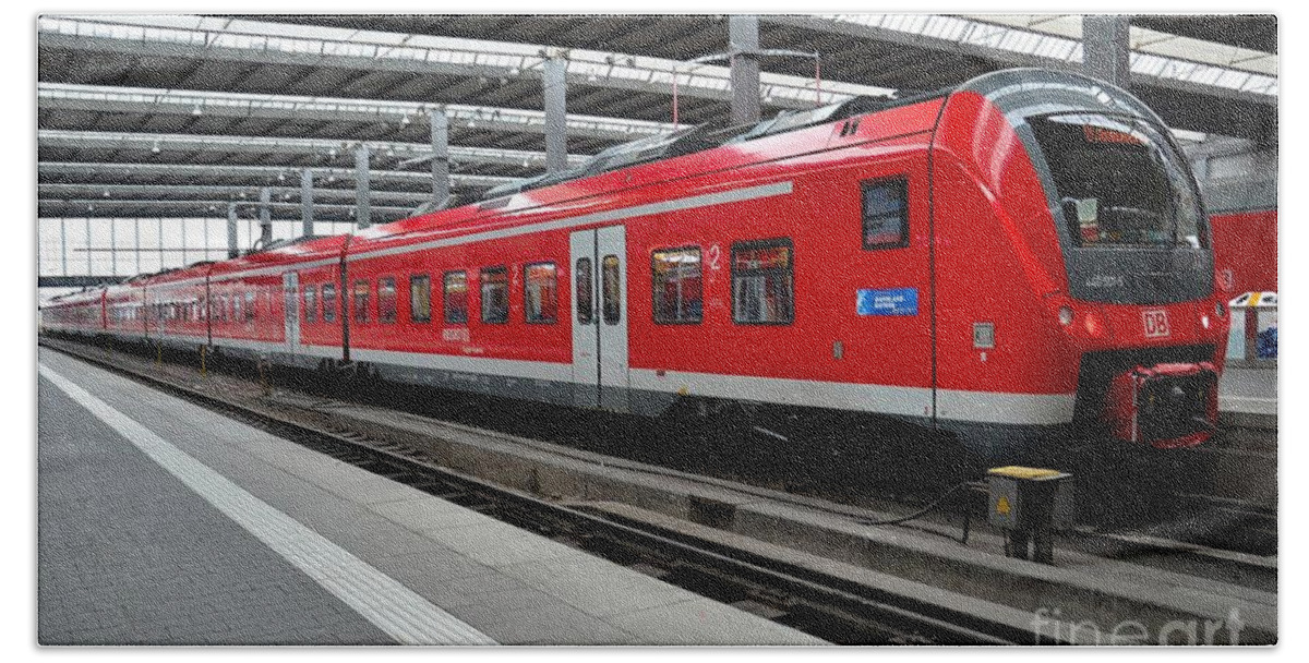 Train Bath Towel featuring the photograph Red commuter train parked at Munich station Germany by Imran Ahmed