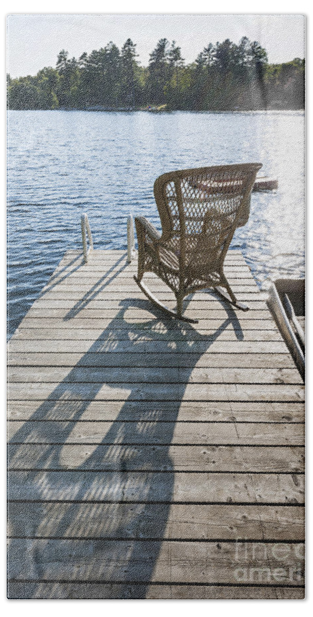 Rocking Bath Towel featuring the photograph Rocking chair on dock 2 by Elena Elisseeva