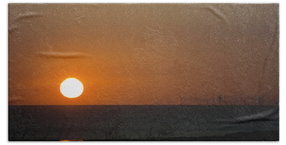 Sun Bath Towel featuring the photograph Sunset Over The Windfarm by Spikey Mouse Photography