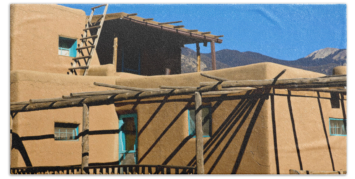 New Mexico Hand Towel featuring the photograph Taos Pueblo Striking Shadows by Marilyn Hunt