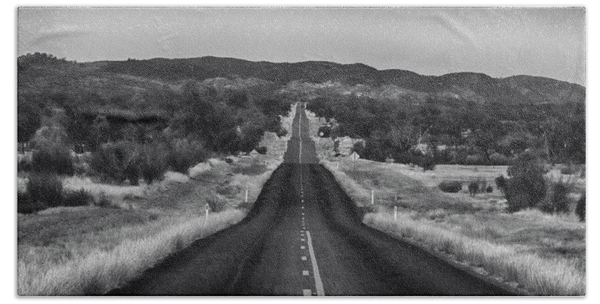 Road Hand Towel featuring the photograph The Road Ahead-Black and White by Douglas Barnard