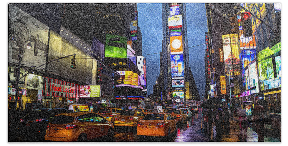 Times Square Hand Towel featuring the photograph Times square in the rain by Garry Gay