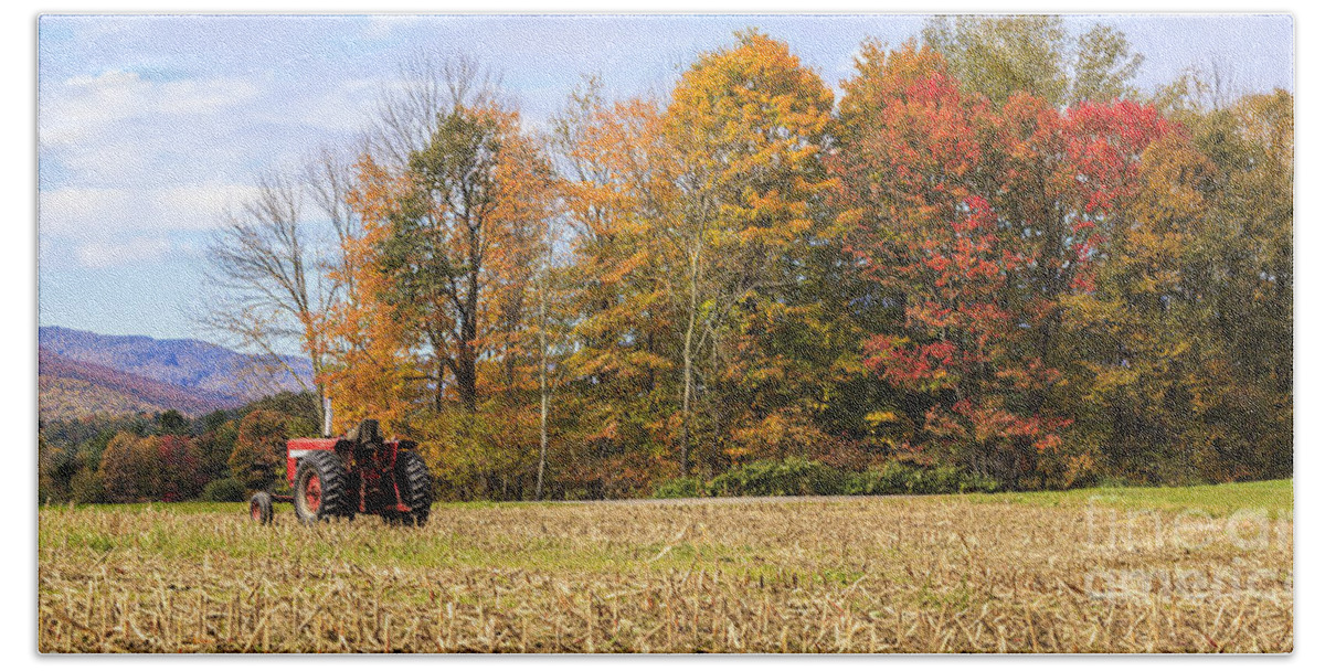 Autumn Hand Towel featuring the photograph Tractor in Autumn New England field by Ken Brown