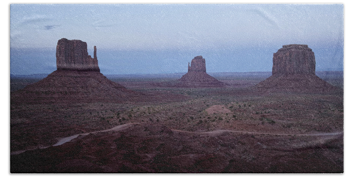 Monument Valley Bath Towel featuring the photograph Twilight At Monument Valley by Lucinda Walter