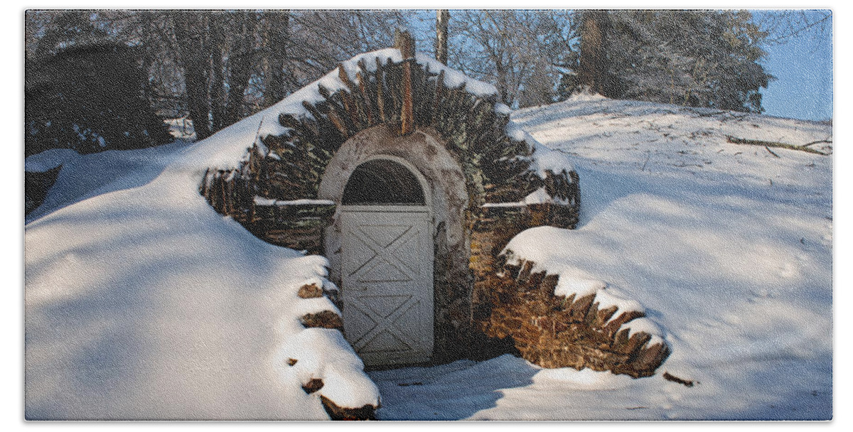 Root Hand Towel featuring the photograph Winter hobbit hole by Michael Porchik