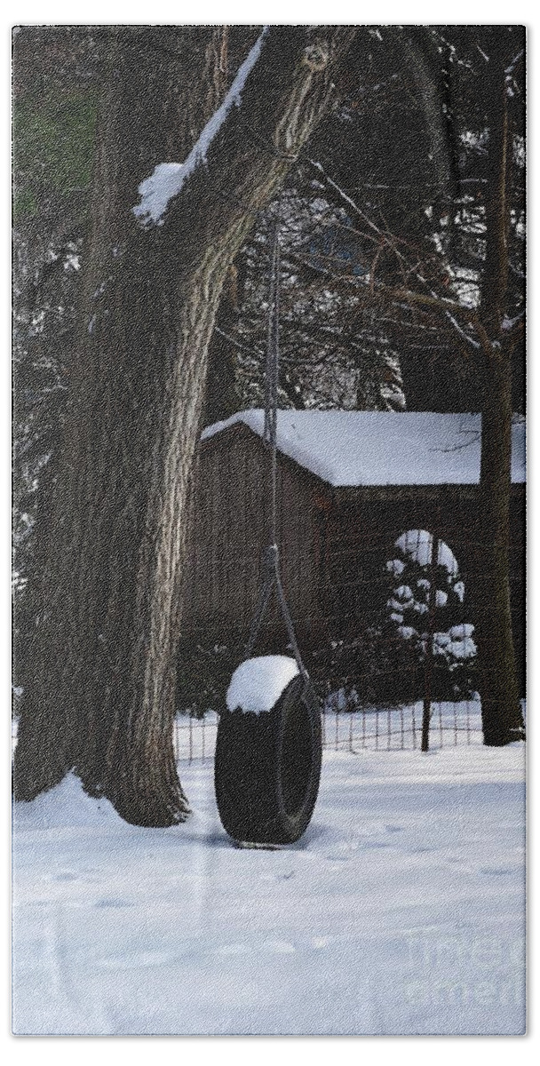Color Bath Towel featuring the photograph Winter Tire Swing by Frank J Casella