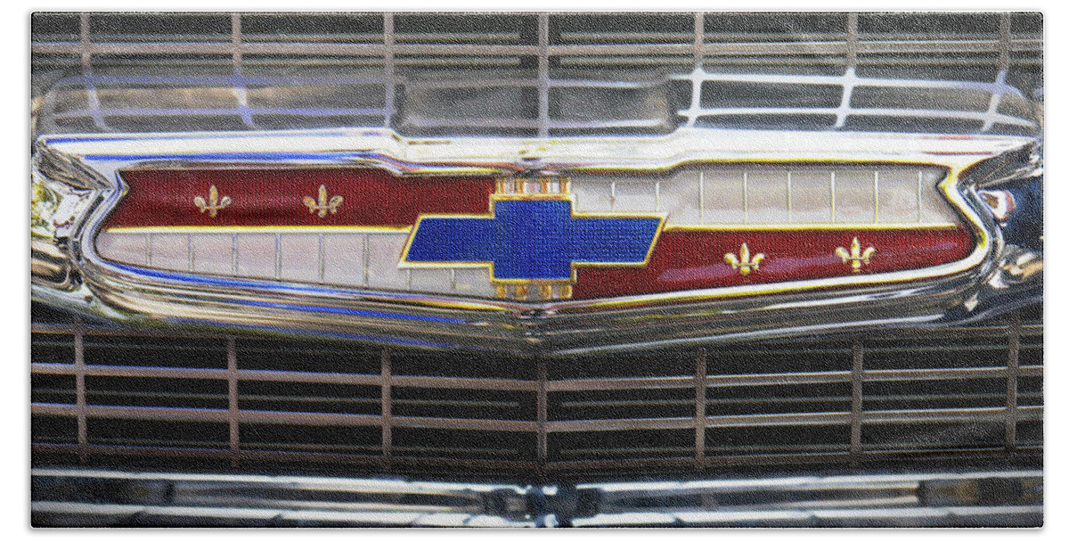 Transportation Hand Towel featuring the photograph 1956 Chevrolet Grill Emblem by Mike McGlothlen