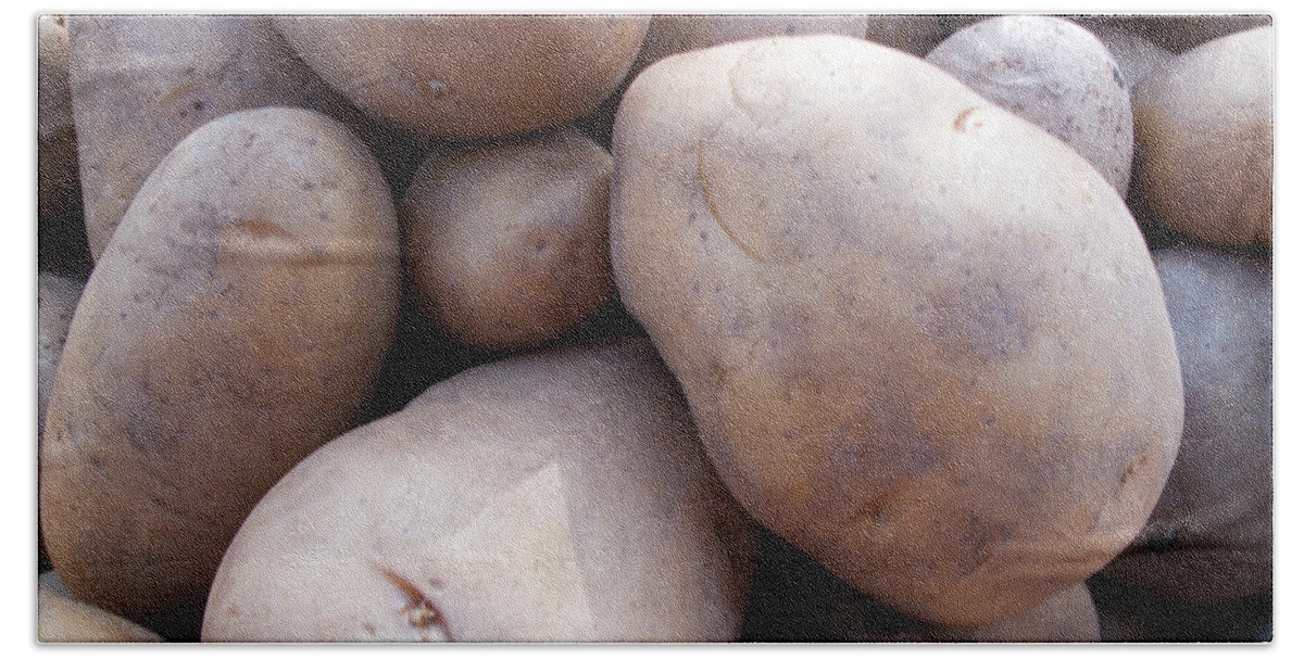 Potato Hand Towel featuring the photograph A pile of large lumpy raw potatoes by Ashish Agarwal
