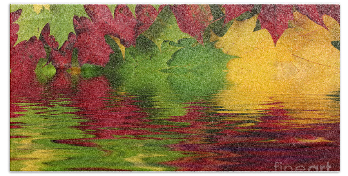 Leaves Bath Towel featuring the photograph Autumn leaves in water with reflection by Simon Bratt