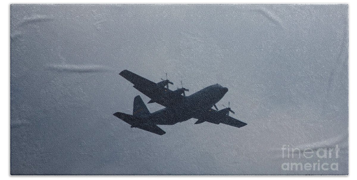 C-130 Bath Towel featuring the photograph C-130 in Flight by Susan Stevens Crosby