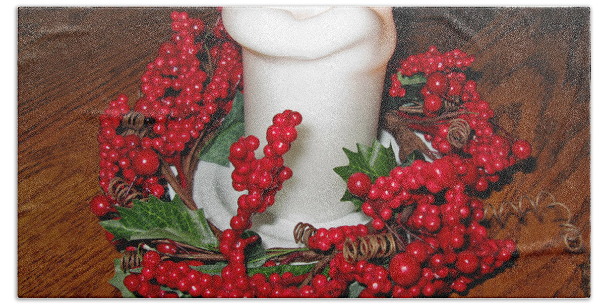 Christmas Candle Hand Towel featuring the photograph Christmas Composition. A White Candle And A Red Wreath by Ausra Huntington nee Paulauskaite