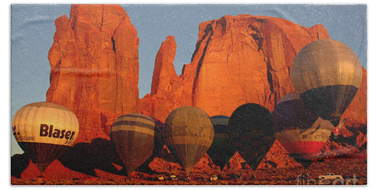 Hot Air Balloons Hand Towel featuring the photograph Dawn Flight in Monument Valley by Vivian Christopher